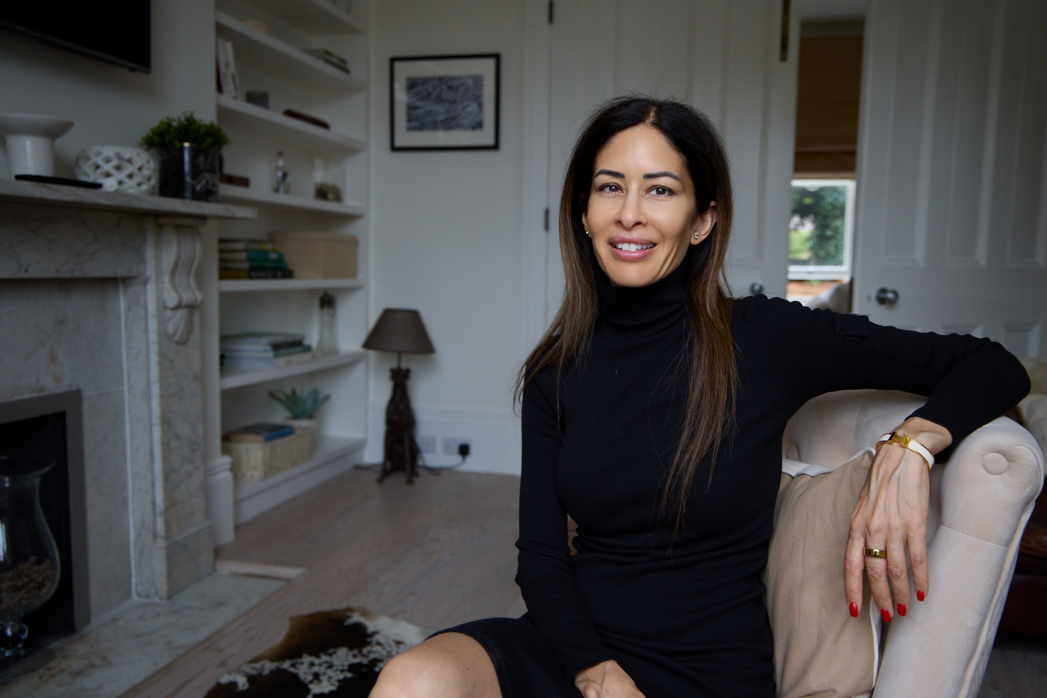 Lena Alami seated in her Henley-on-Thames coaching space